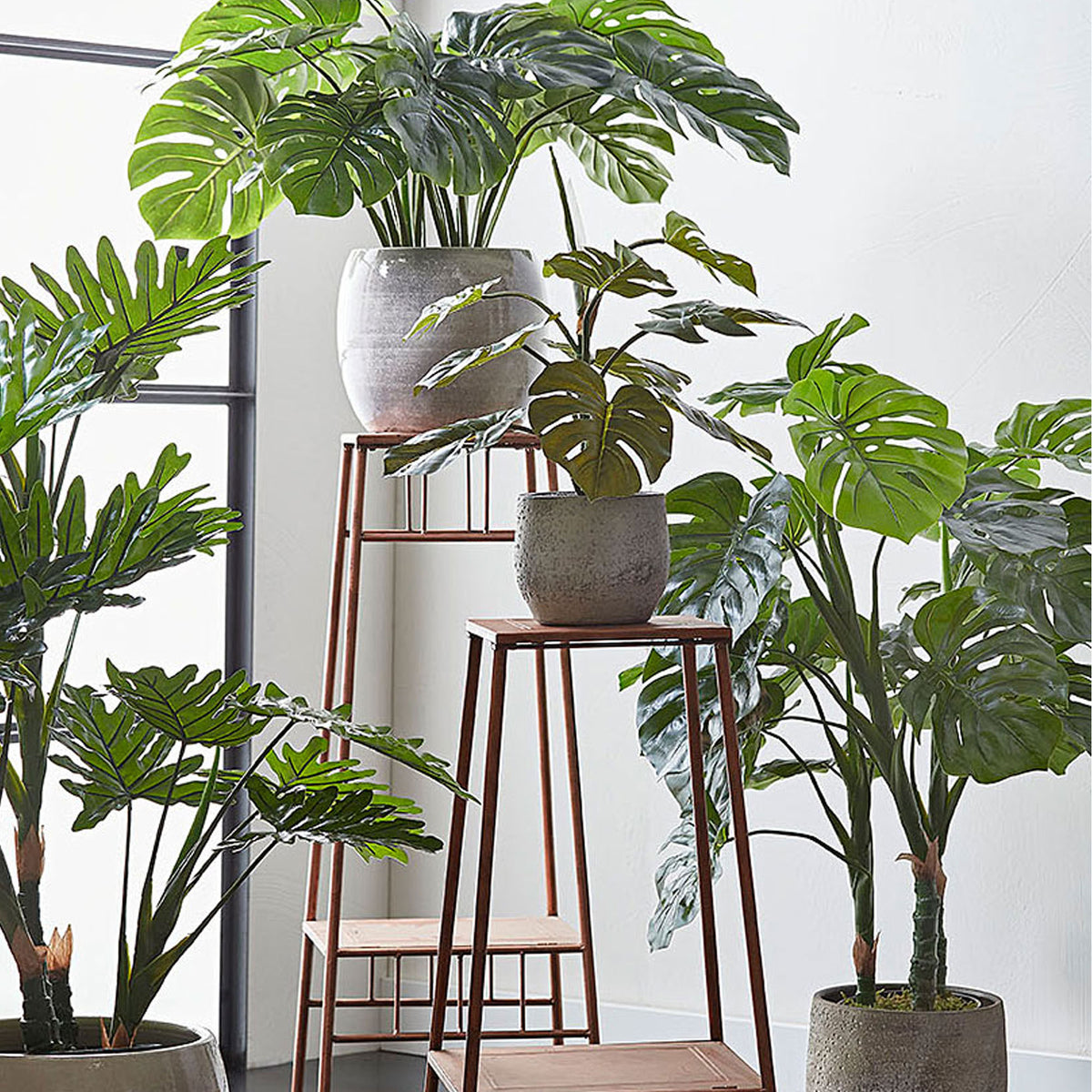 Artificial Monstera including round plastic decorative pot