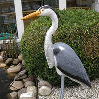 Plastic heron on two legs