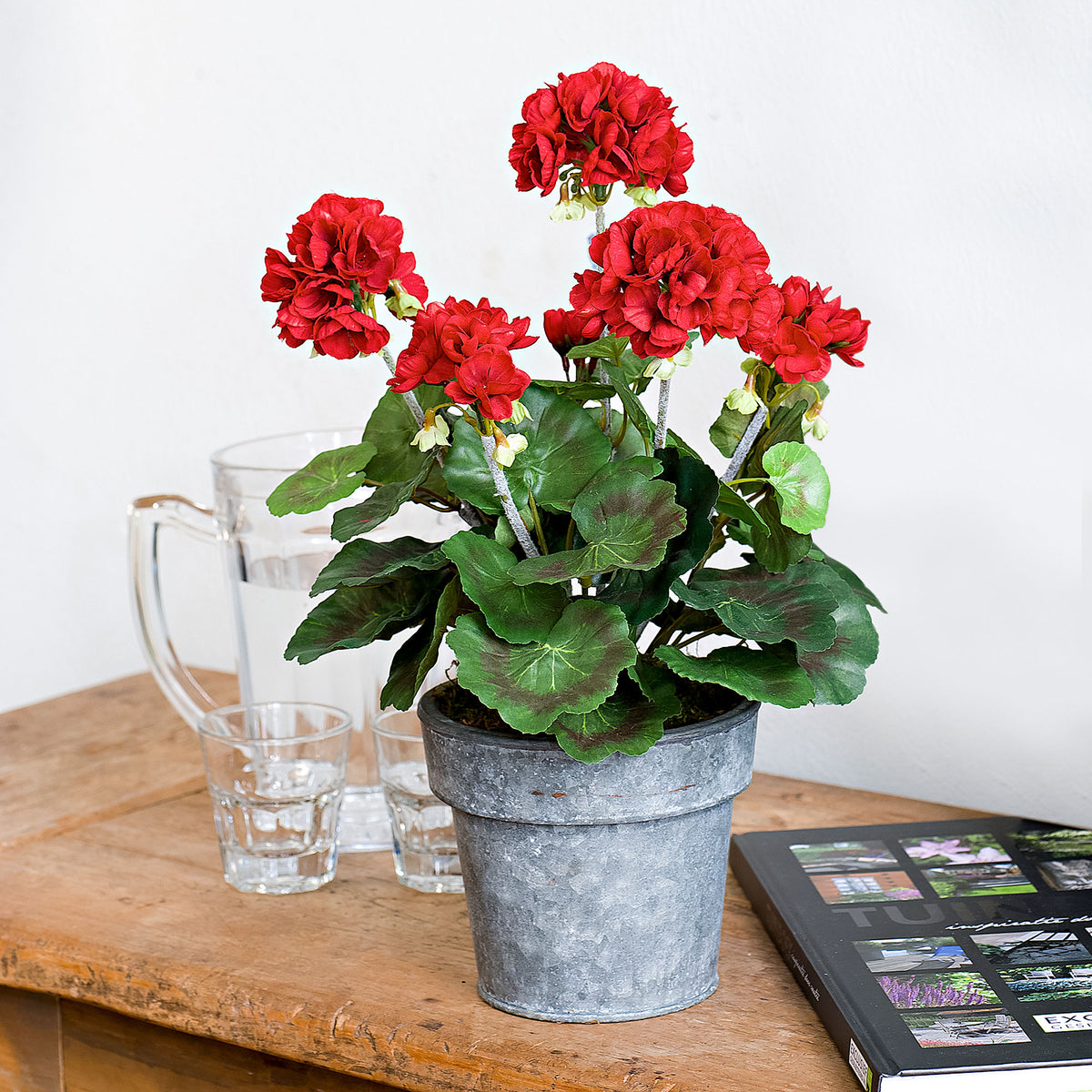 Artificial plant Geraniums red including round earthenware decorative pot